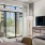 Furnished Studio apartment home with large glass windows and tons of natural light