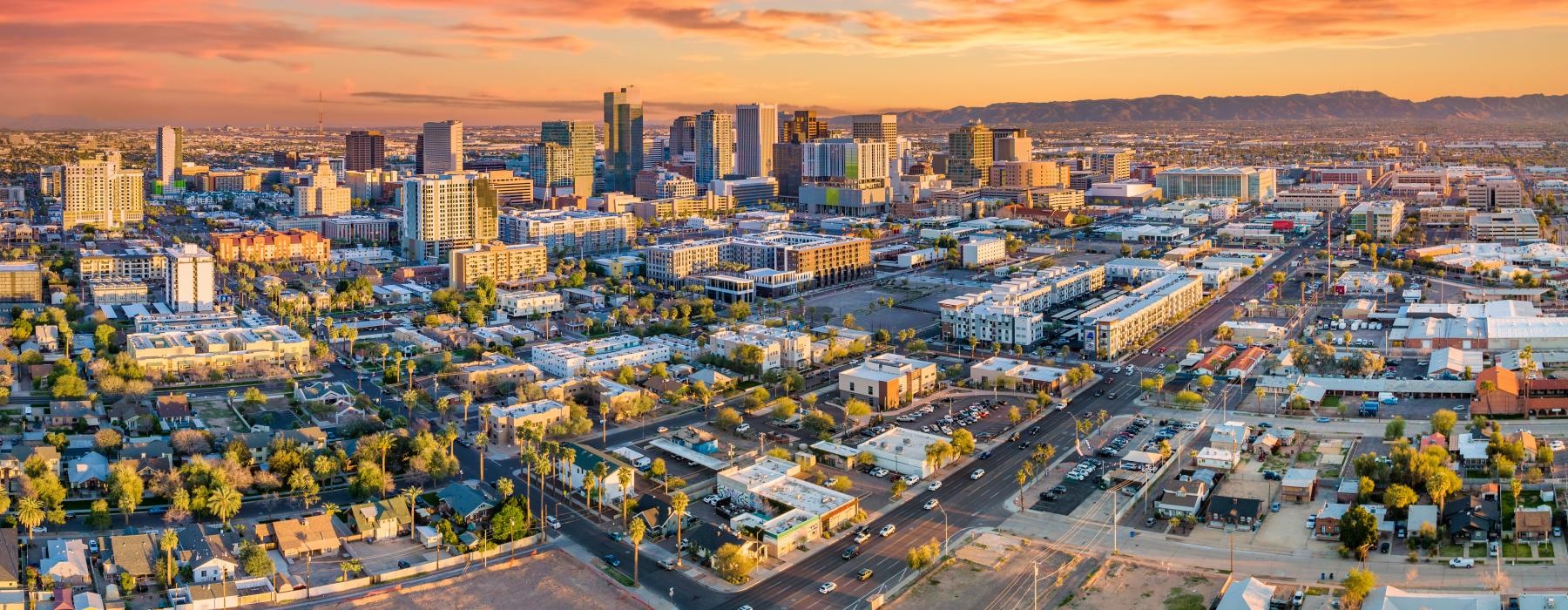 a city with a sunset