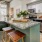 a kitchen with bar stools at island