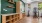 gym with wood floors and shelving
