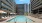 pool with lounge chairs