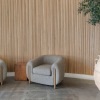 two chairs near a plant