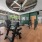 A community fitness center with cardio machines and weight lifting equipment at Adara luxury apartments in Downtown Phoenix.