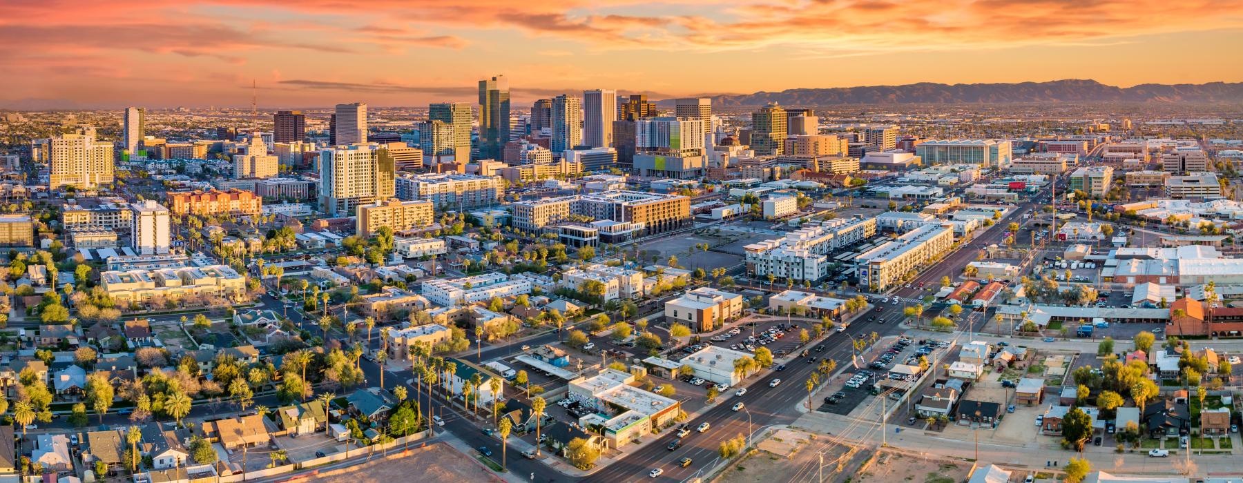 a city with a sunset